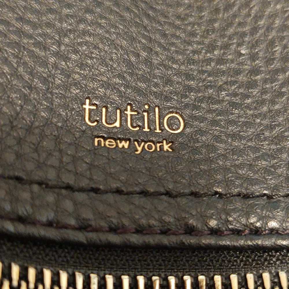 EUC Tutilo Quilted Black Backpack
